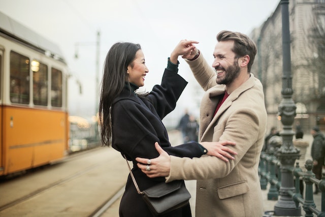 couple near a tram station romance books